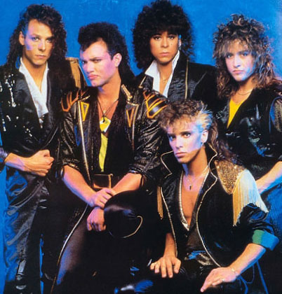 Michael (far right) with Queensrÿche in 1986. Oh dear!